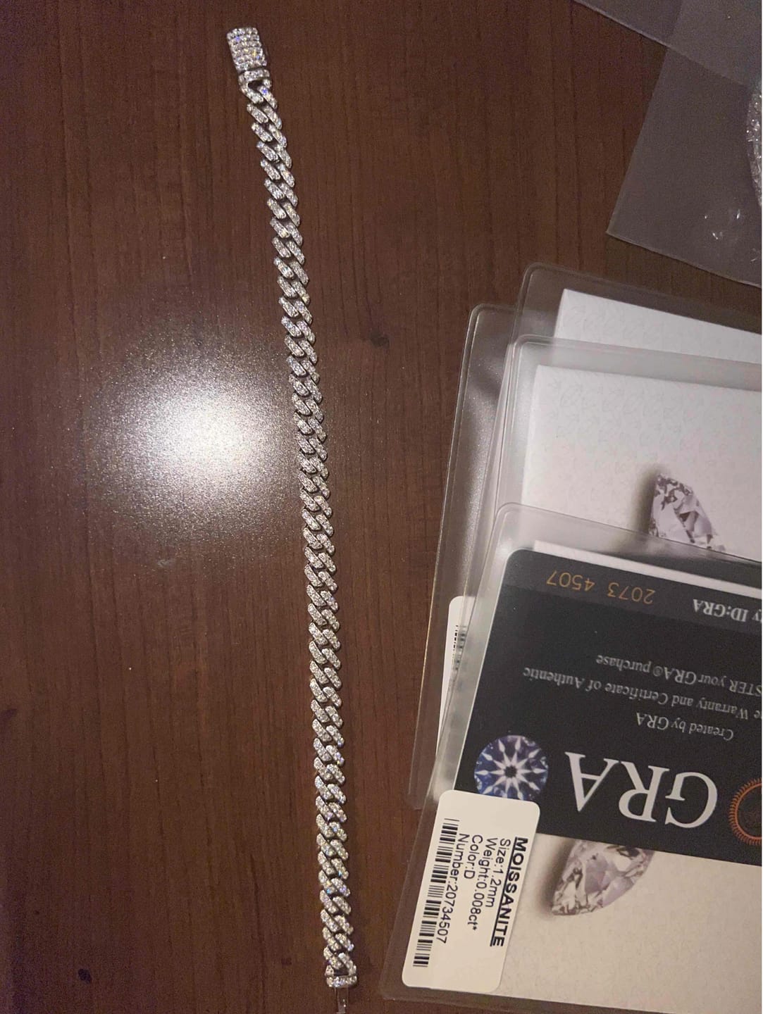 Customer photo review of PULSERA CUBANA DE MOISSANITA CON ORO BLANCO DE 6mm