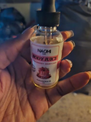 Customer photo review of BOGO Naomi Body Juice Oil