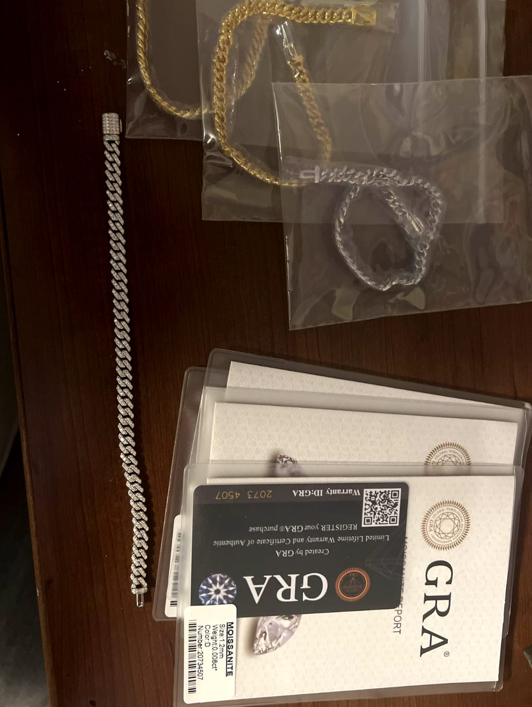 Customer photo review of PULSERA CUBANA DE MOISSANITA CON ORO BLANCO DE 6mm