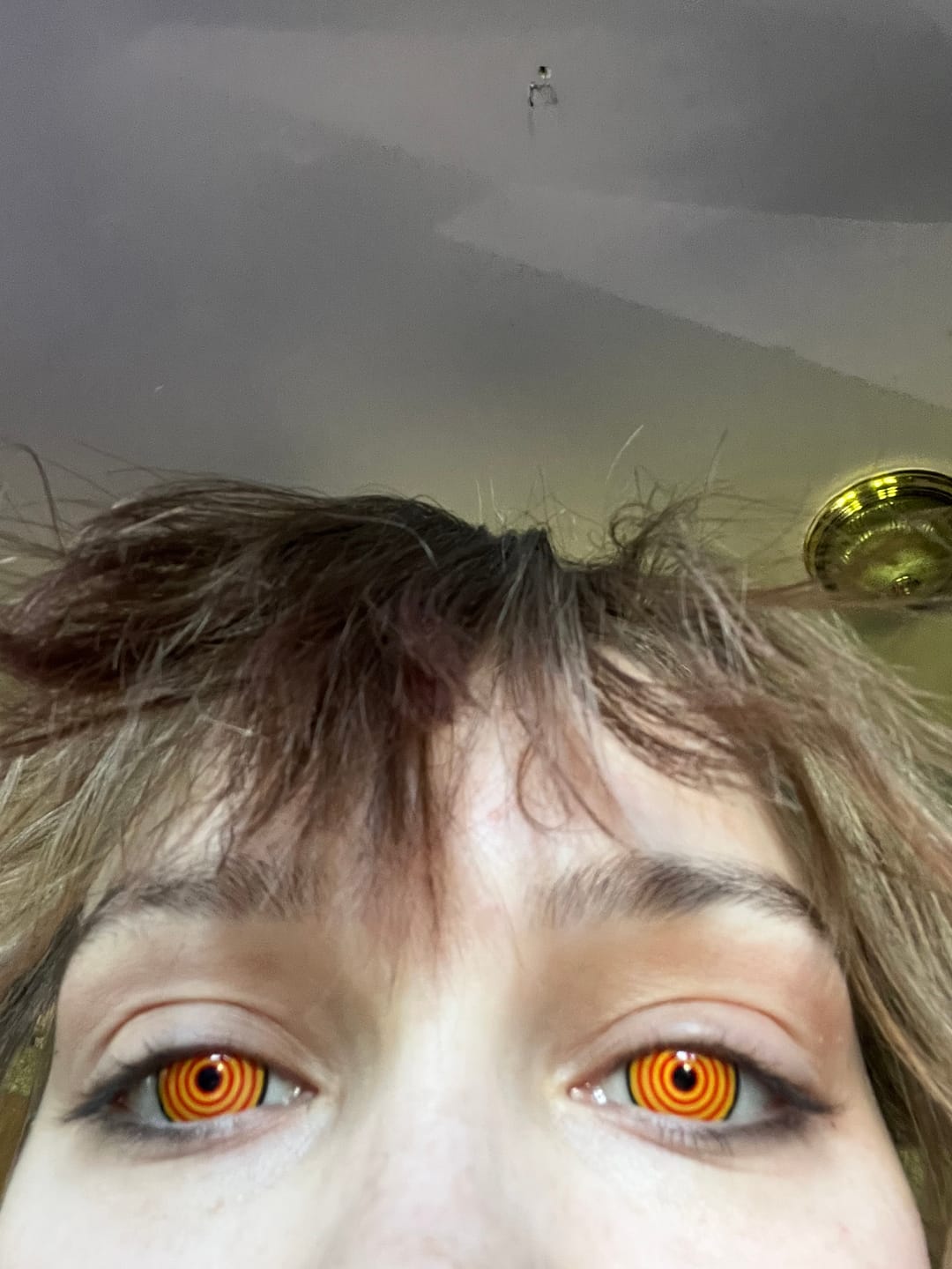 Customer photo review of Cosplay Circle Line Red Yellow Colored Contact Lenses