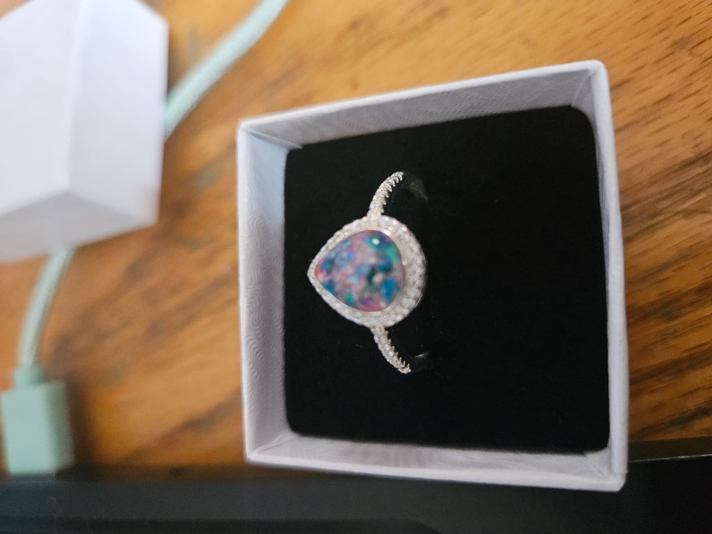 Customer photo review of Bedazzled Pear Opal Ring with Cremation Ashes