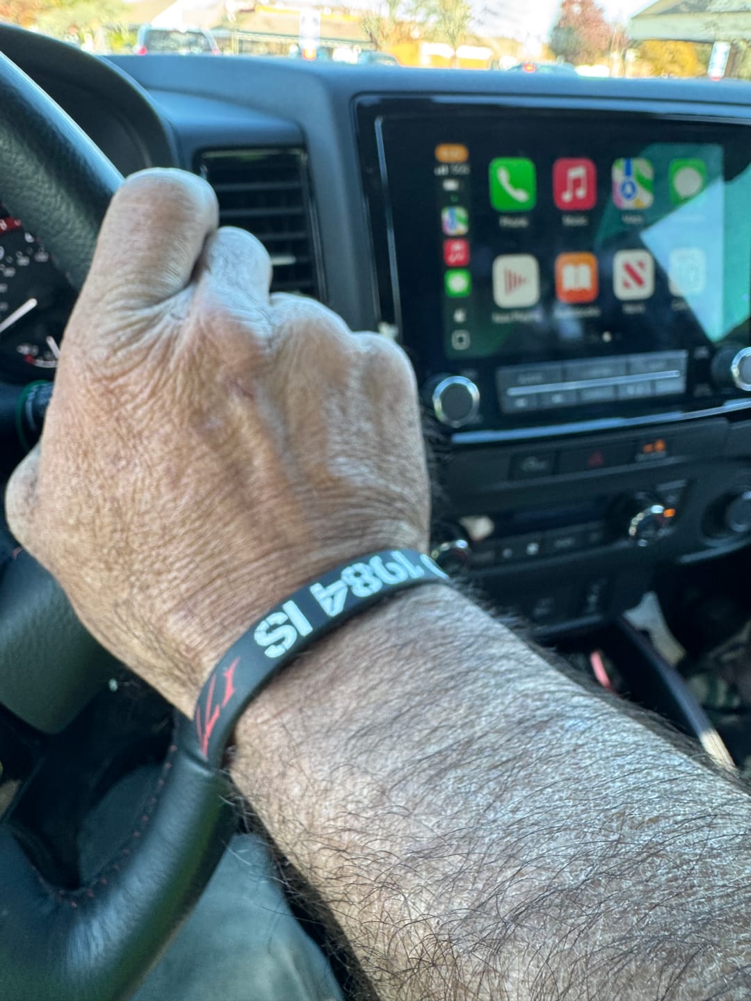 Customer photo review of The Answer to 1984 Wristband