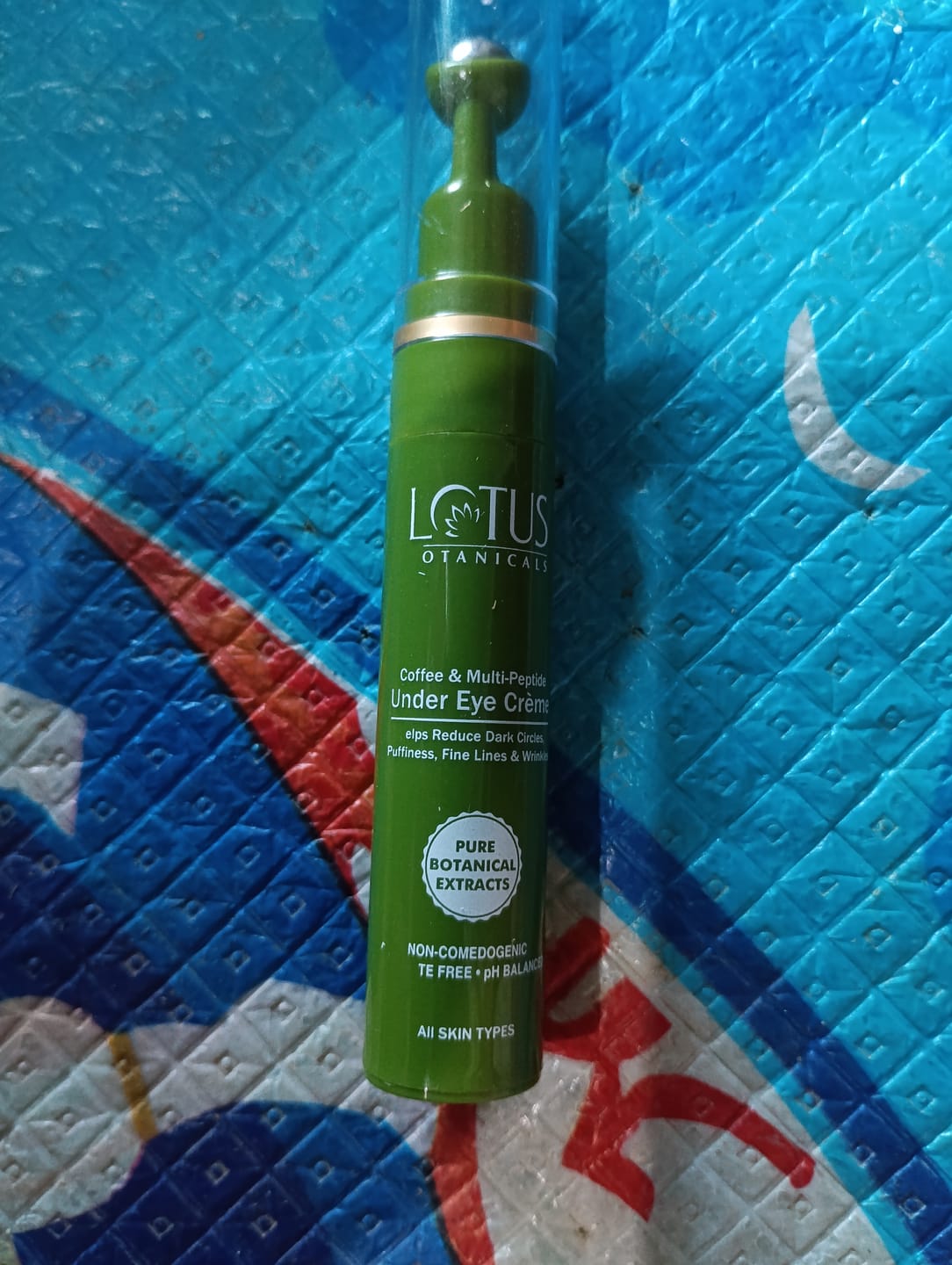Customer photo review of Coffee and Multi-Peptide Under Eye Crème with Vitamin E