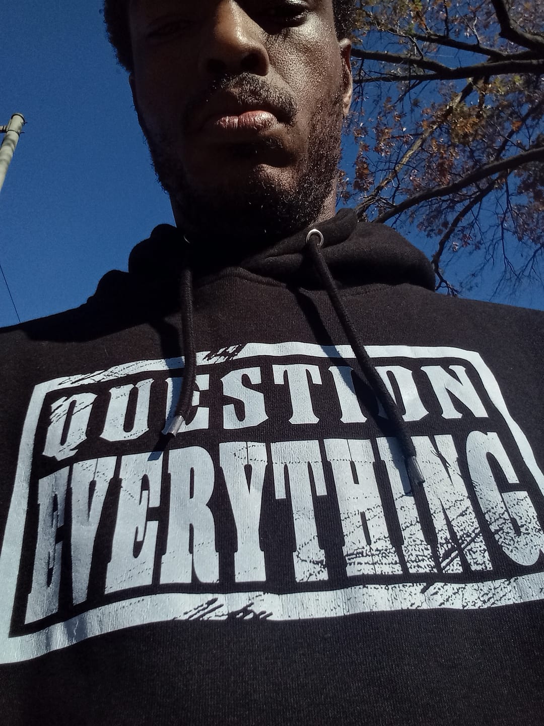 Customer photo review of Question Everything Hoodie