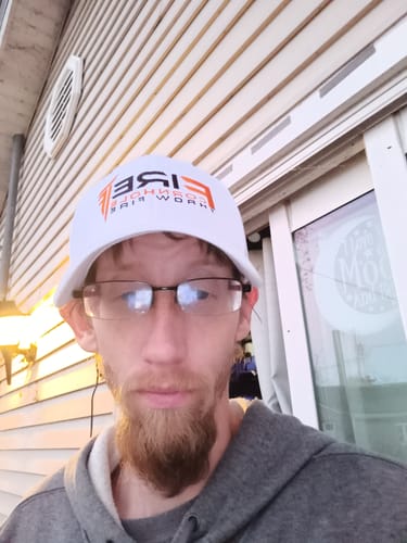 Customer photo review of Fire Cornhole Hat - White and Orange