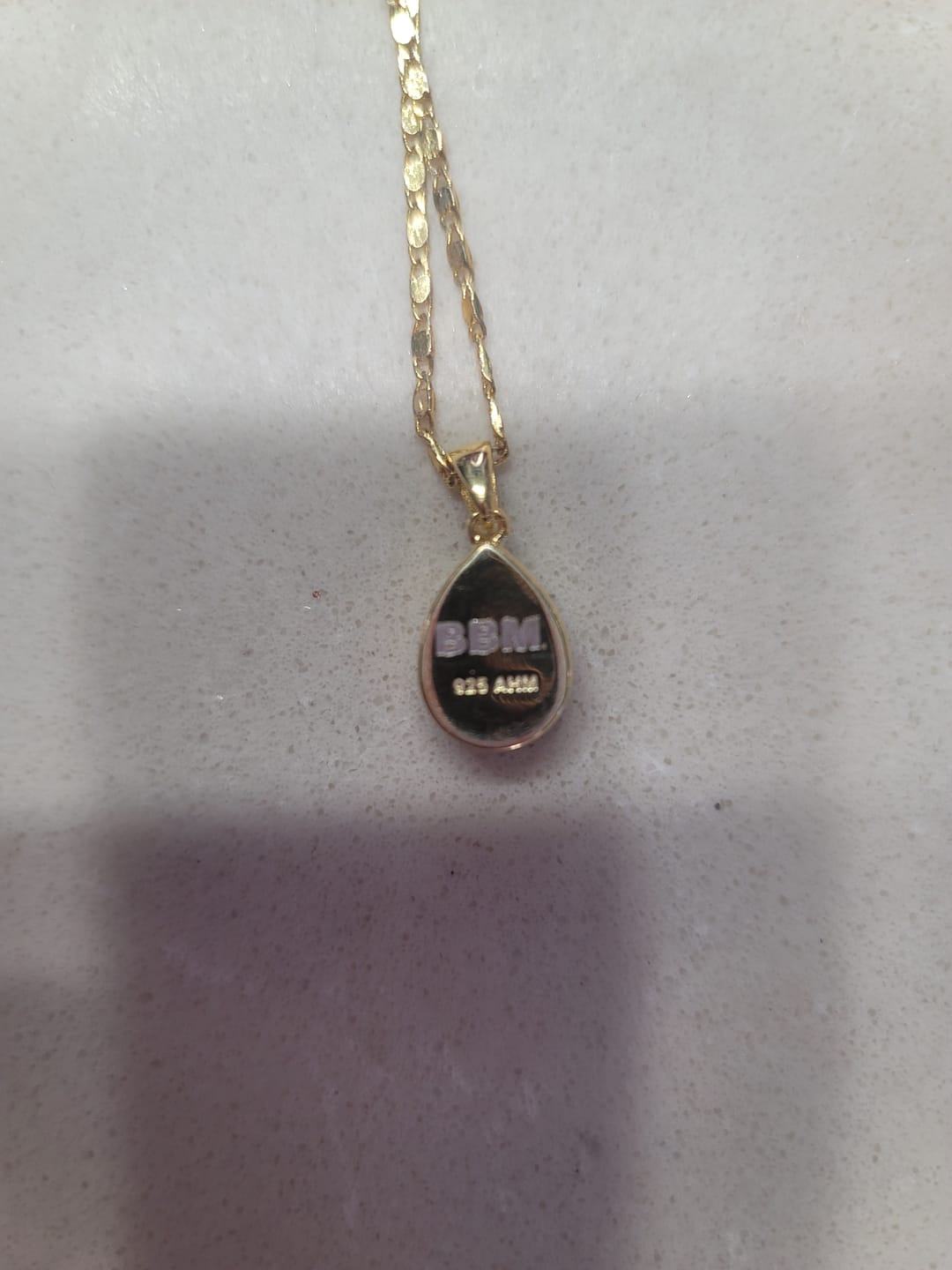 Customer photo review of Petite Pear Drop with Cremation Ashes