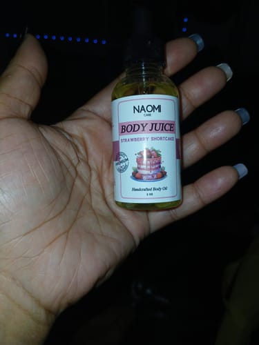 Customer photo review of BOGO Naomi Body Juice Oil
