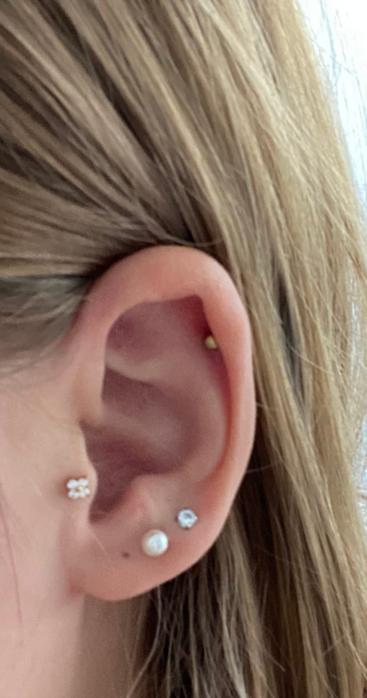 Customer photo review of Cute Four Piercing | Titan