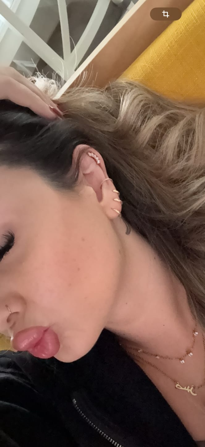 Customer photo review of Conch Clicker | Titan Piercing