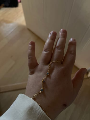 Customer photo review of Madeleine Hand Chain Blue & Gold
