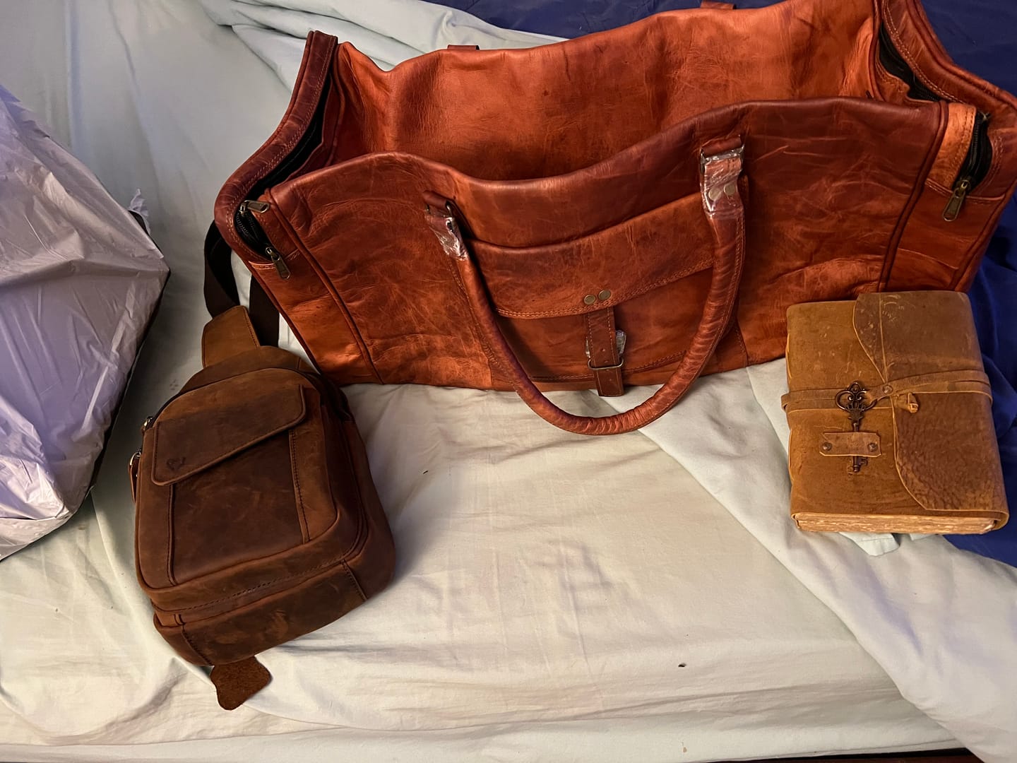 Customer photo review of Cowhide Leather Sling Bag