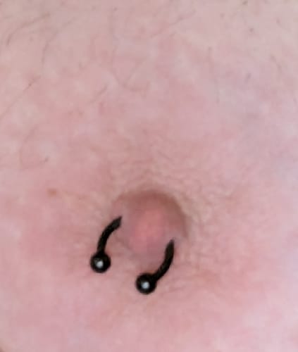 Customer photo review of Metallic Black Circular Horse Shoe Body Jewellery