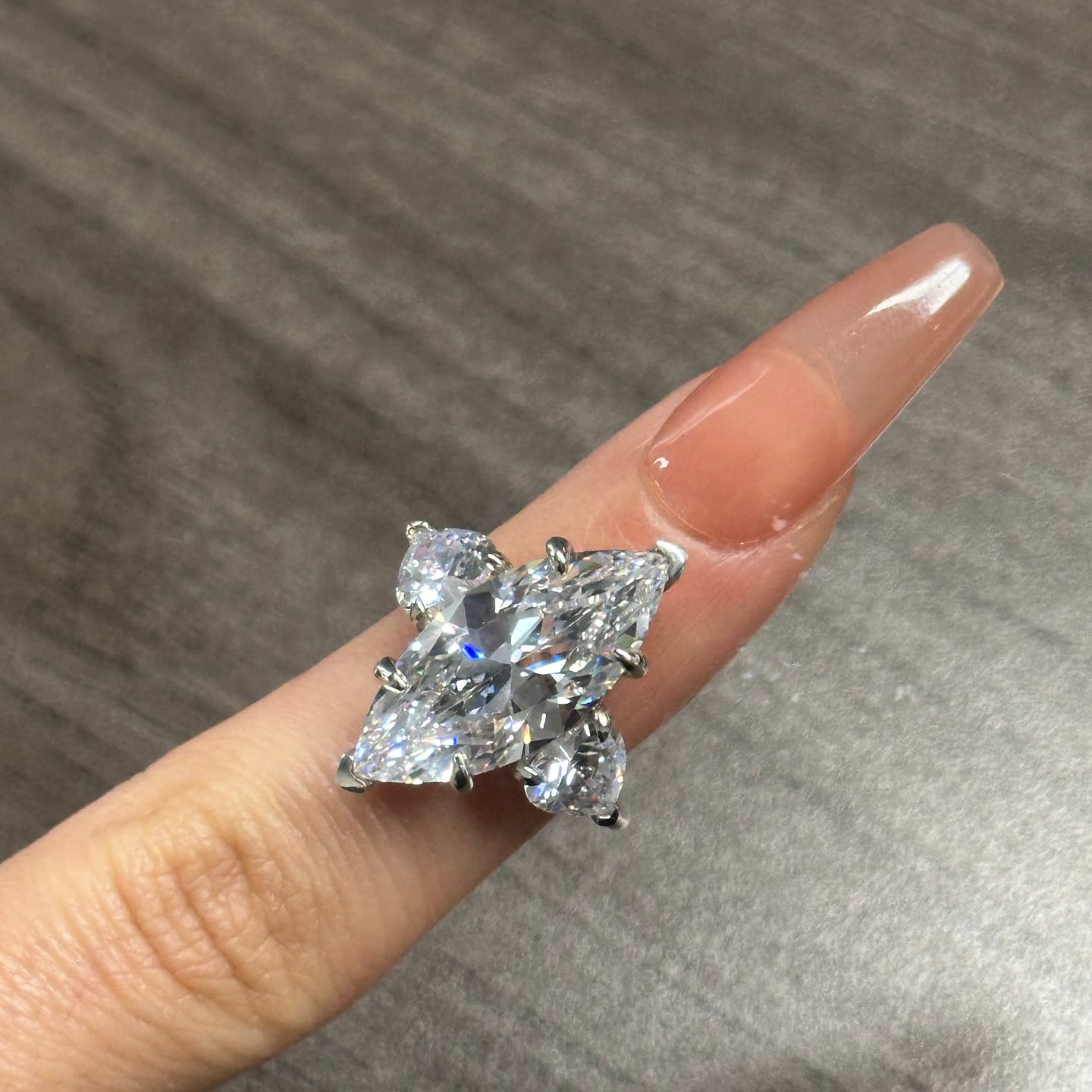 Customer photo review of Louily Marquise Cut Three Stone Engagement Ring In Sterling Silver