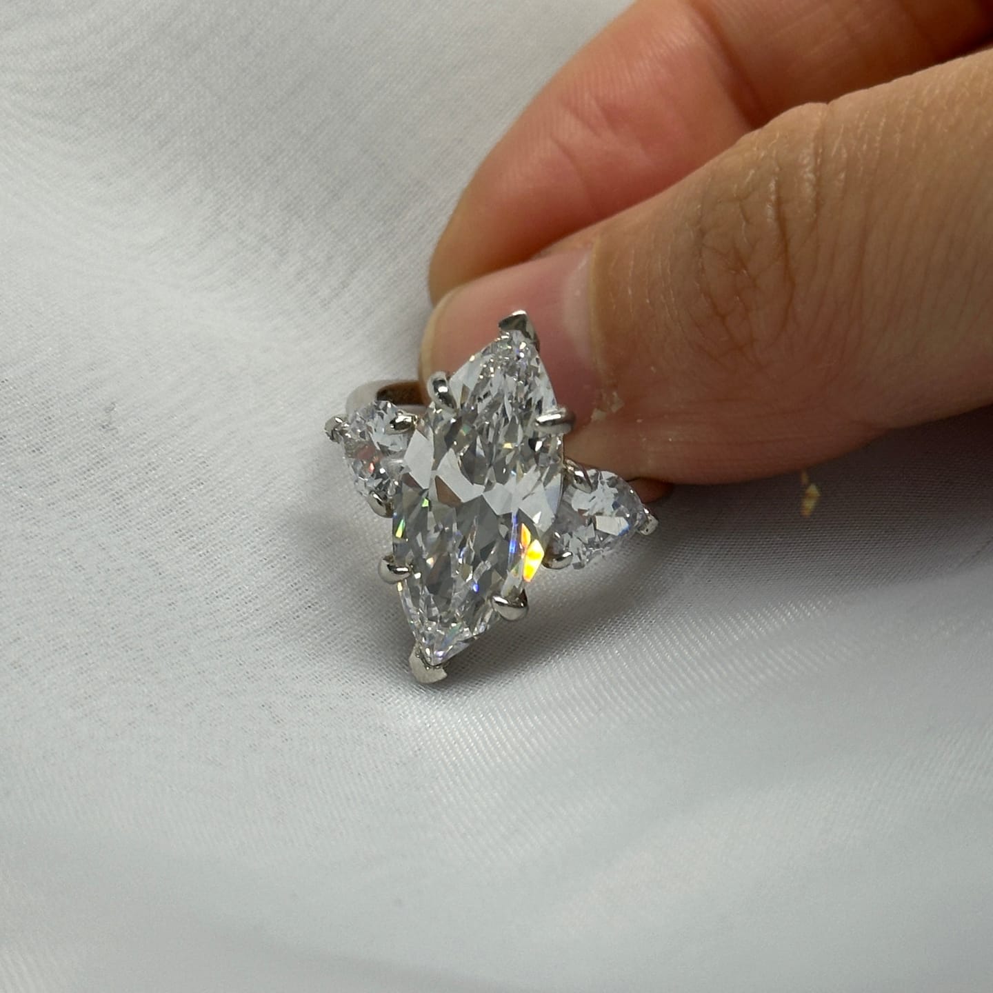 Customer photo review of Louily Marquise Cut Three Stone Engagement Ring In Sterling Silver