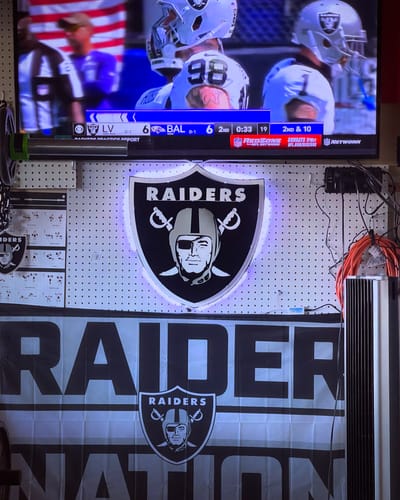 Customer photo review of Las Vegas Raiders Shield 3D Vintage Metal Wall Art