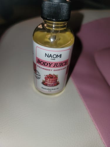 Customer photo review of BOGO Naomi Body Juice Oil