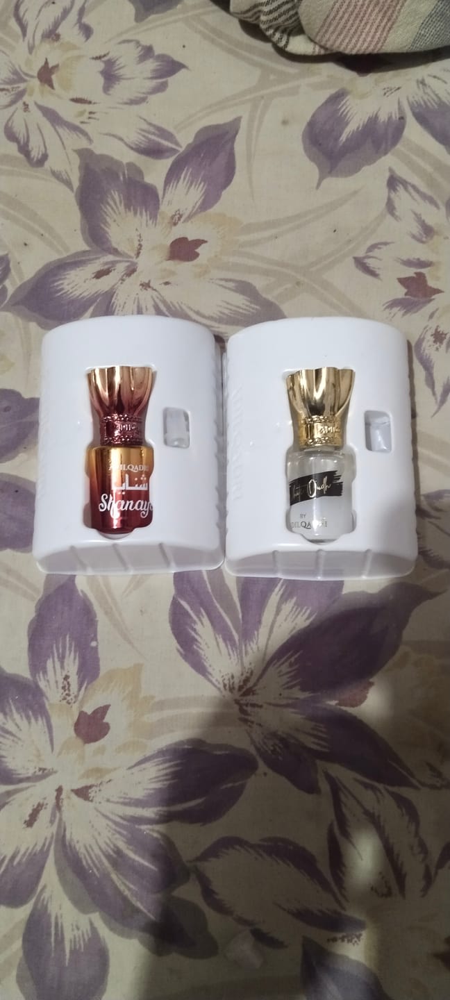 Customer photo review of 2 Pcs Attar Set Shanaya And White Oudh 5.5 Ml Each
