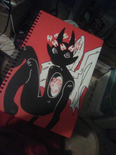 Customer photo review of Angel of the Teeth Notebook