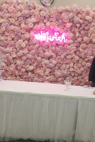 Customer photo review of Pink and Purple Roses Fabric Flower Wall for Birthday Party