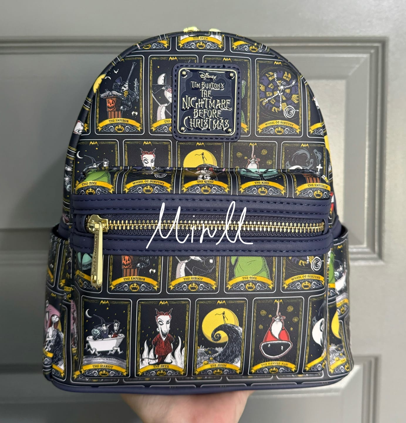Customer photo review of Loungefly Disney Nightmare Before Christmas Allover Print Tarot Mini Backpack - 707 Street Exclusive