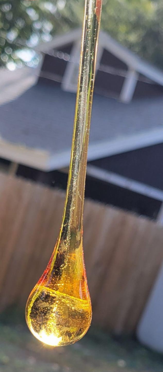 Customer photo review of Suncatcher Drop with Infused Cremation Ashes