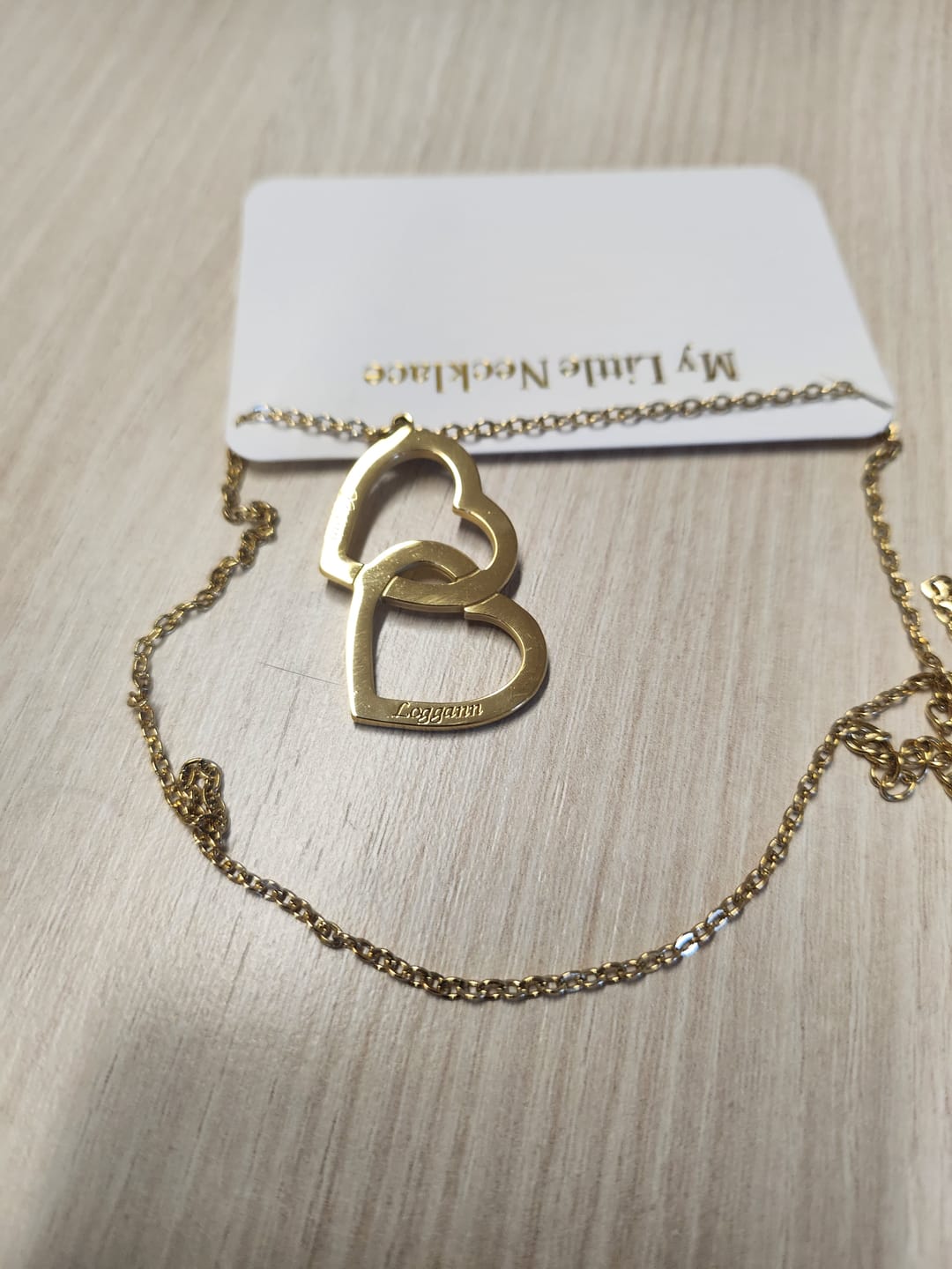 Customer photo review of Collier Double Coeur Personnalisable Deux Prénoms