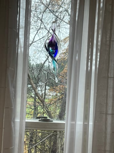 Customer photo review of Dichroic Spinner Suncatcher with Infused Cremains