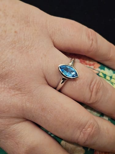 Customer photo review of Surf Moon Ring with Swiss Blue Topaz