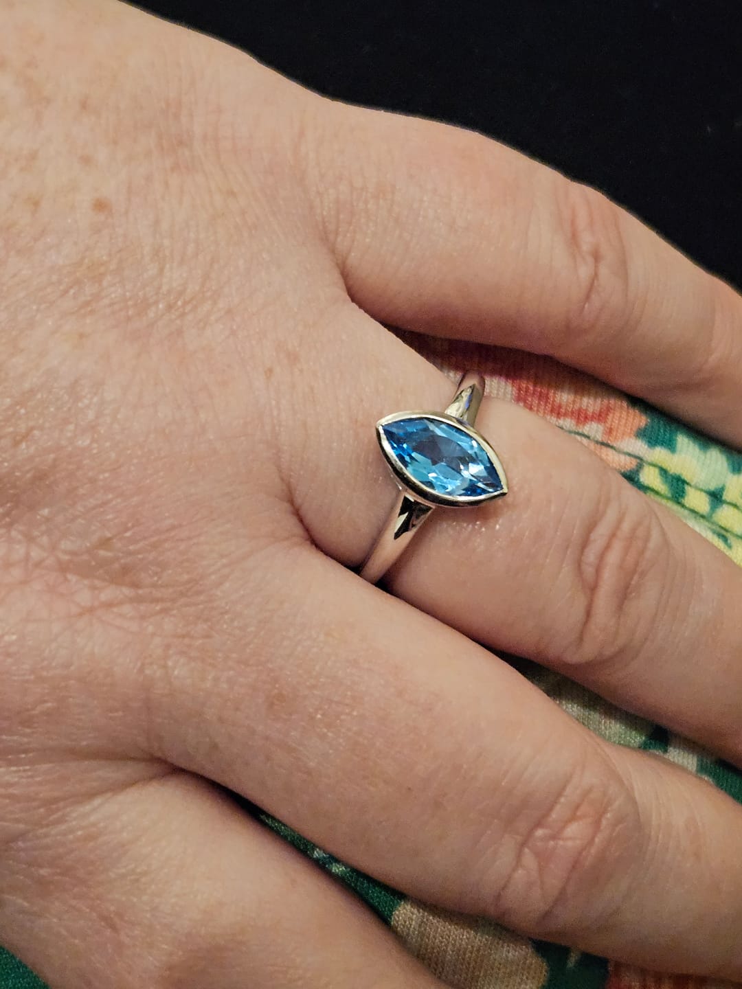 Customer photo review of Surf Moon Ring with Swiss Blue Topaz