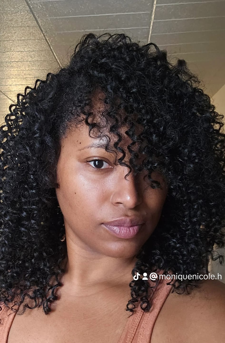 Customer photo review of Outre Human Hair Blend Big Beautiful Hair Clip In 9 - 4A KINKY CURLY