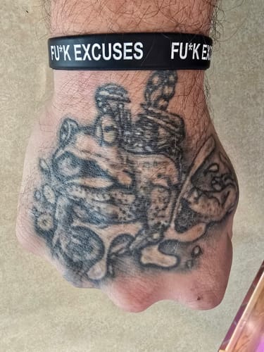 Customer photo review of F*ck Excuses Rubber Wrist Band by Iron Addicts Brands | CT Fletcher