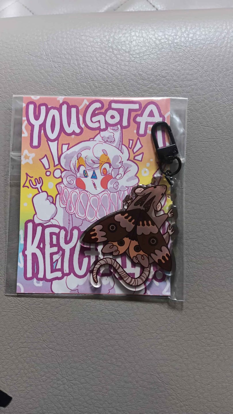 Customer photo review of Mothrat Keychain