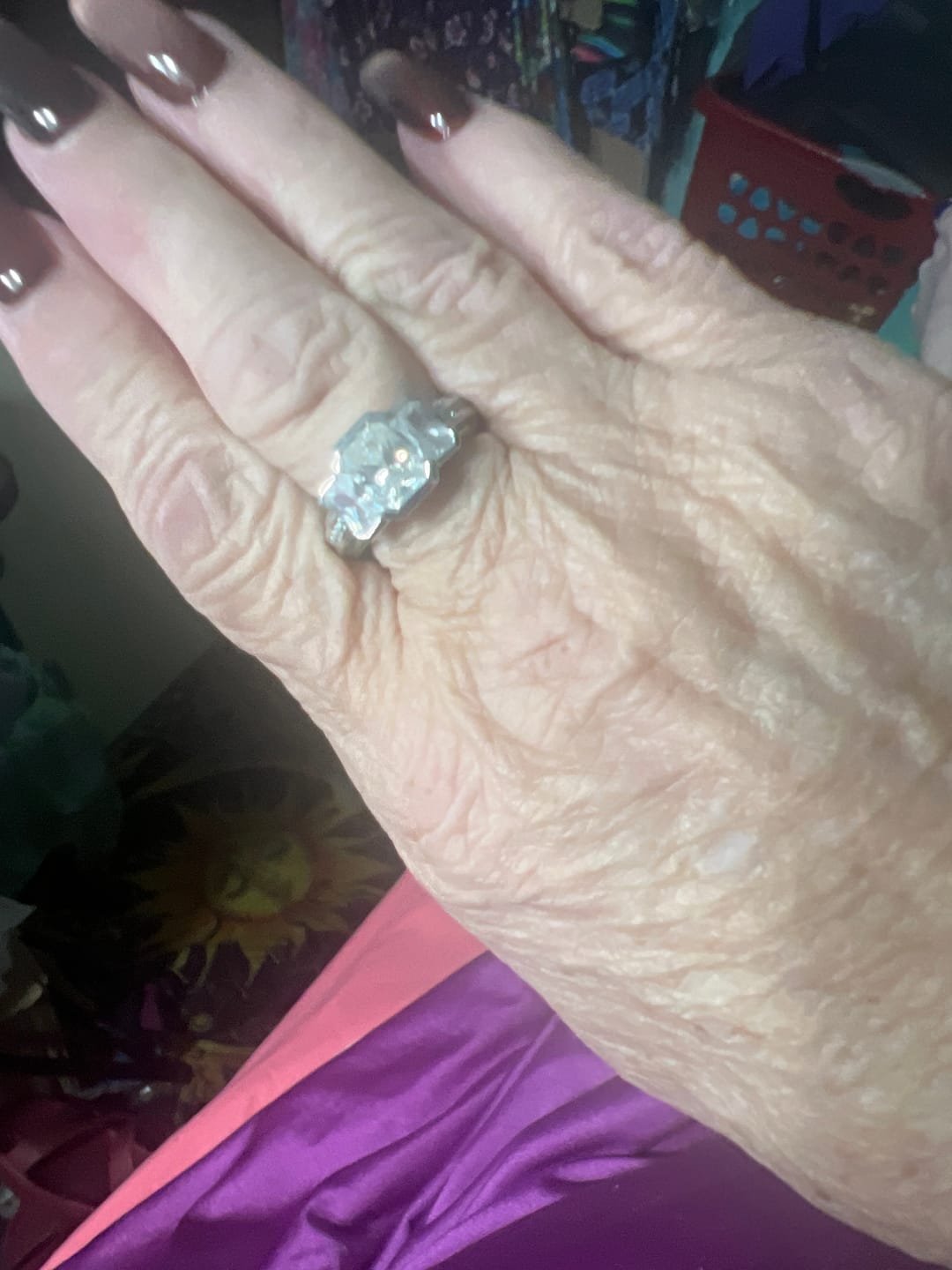Customer photo review of Three Stone Radiant Moissanite Staircase Channel Set Euro Engagement Ring