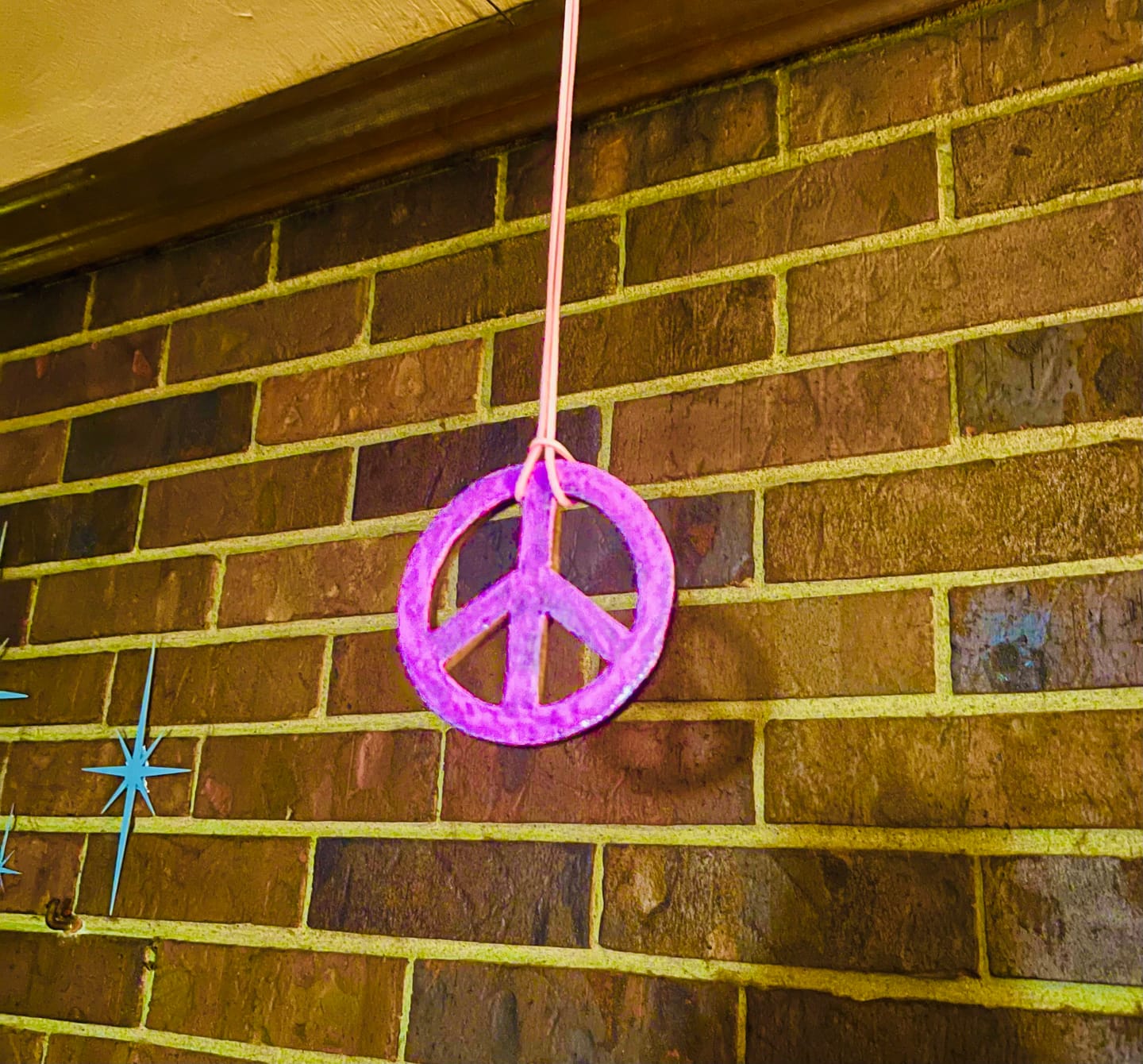 Customer photo review of Carved Wooden Peace Sign