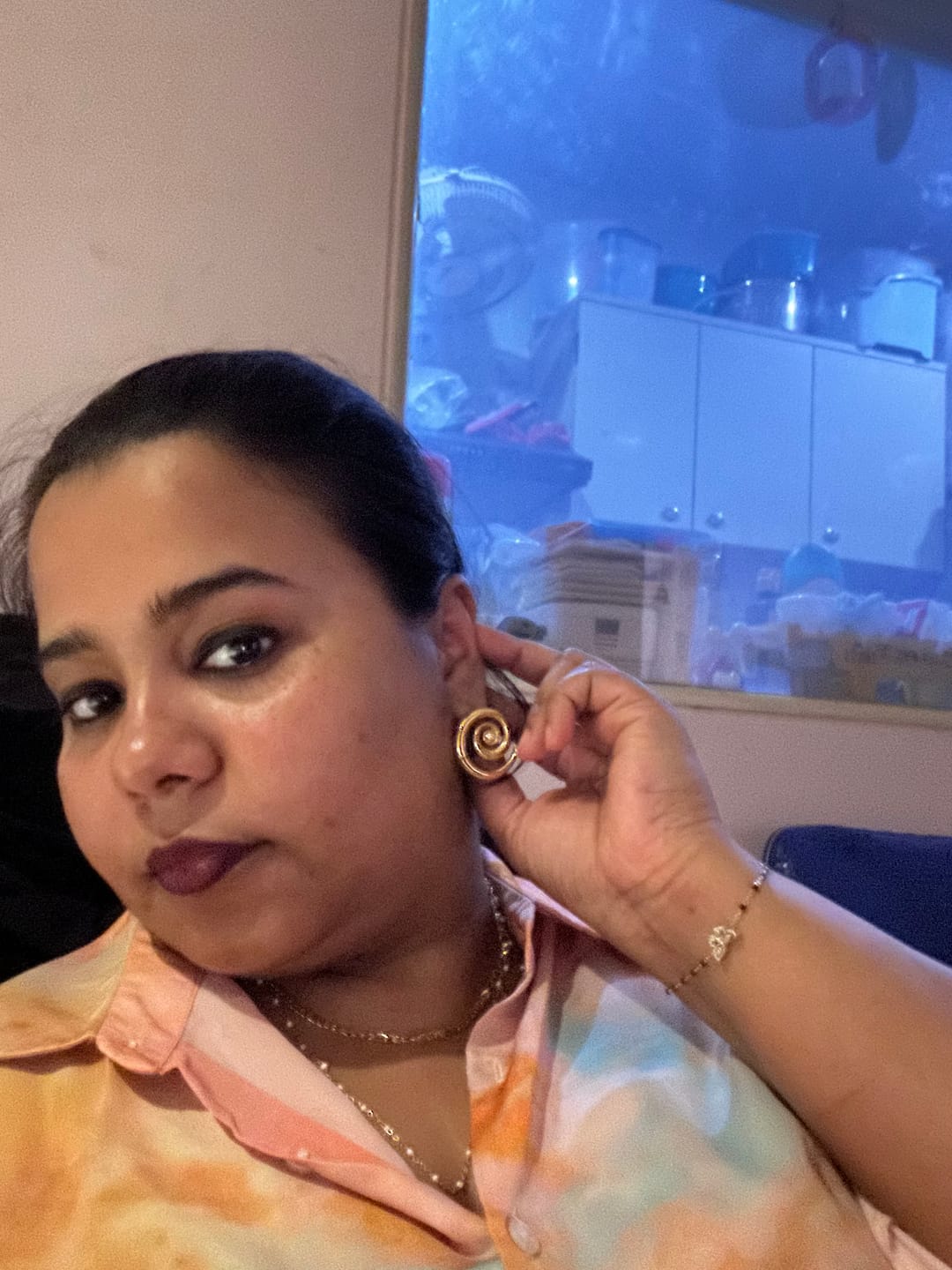 Customer photo review of Cosmic Swirl Earrings
