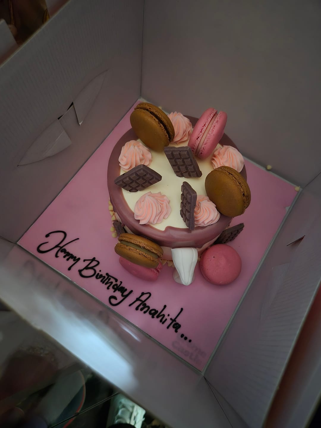 Customer photo review of Purple Drip Macaron Cake