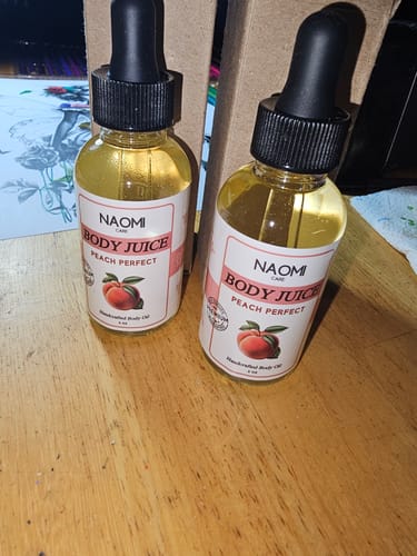Customer photo review of BOGO Naomi Body Juice Oil