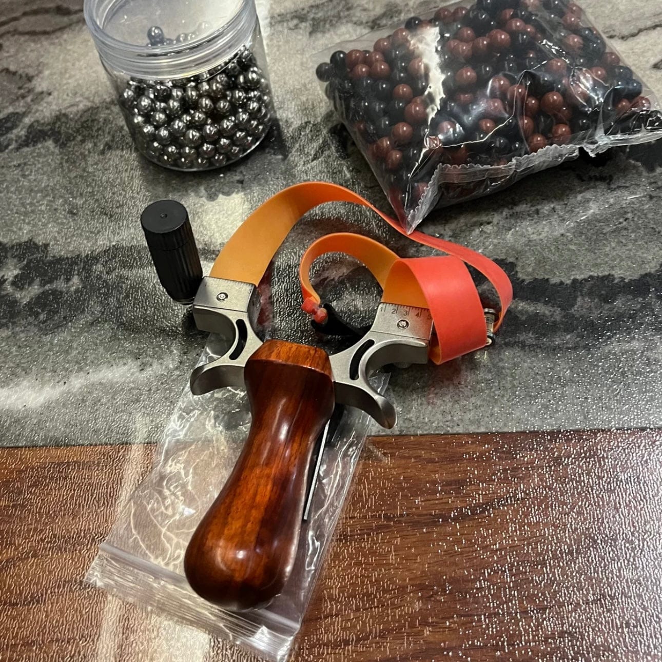 Customer photo review of Stainless Steel Wooden Handle Laser Slingshot