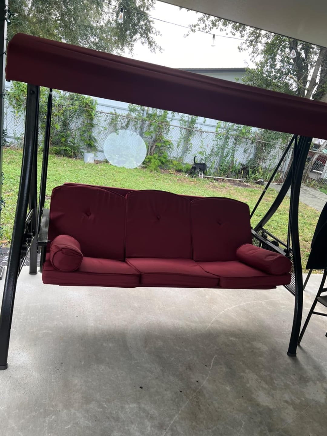 Customer photo review of 3-Seat Outdoor Porch Swing with Adjustable Canopy Backrest and 2 Side Trays, Wine Red