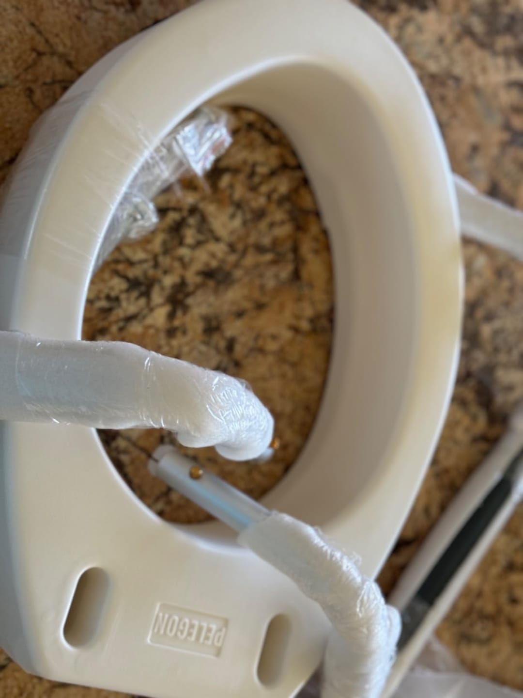 Customer photo review of Raised Toilet Seat With Handles (300lb)