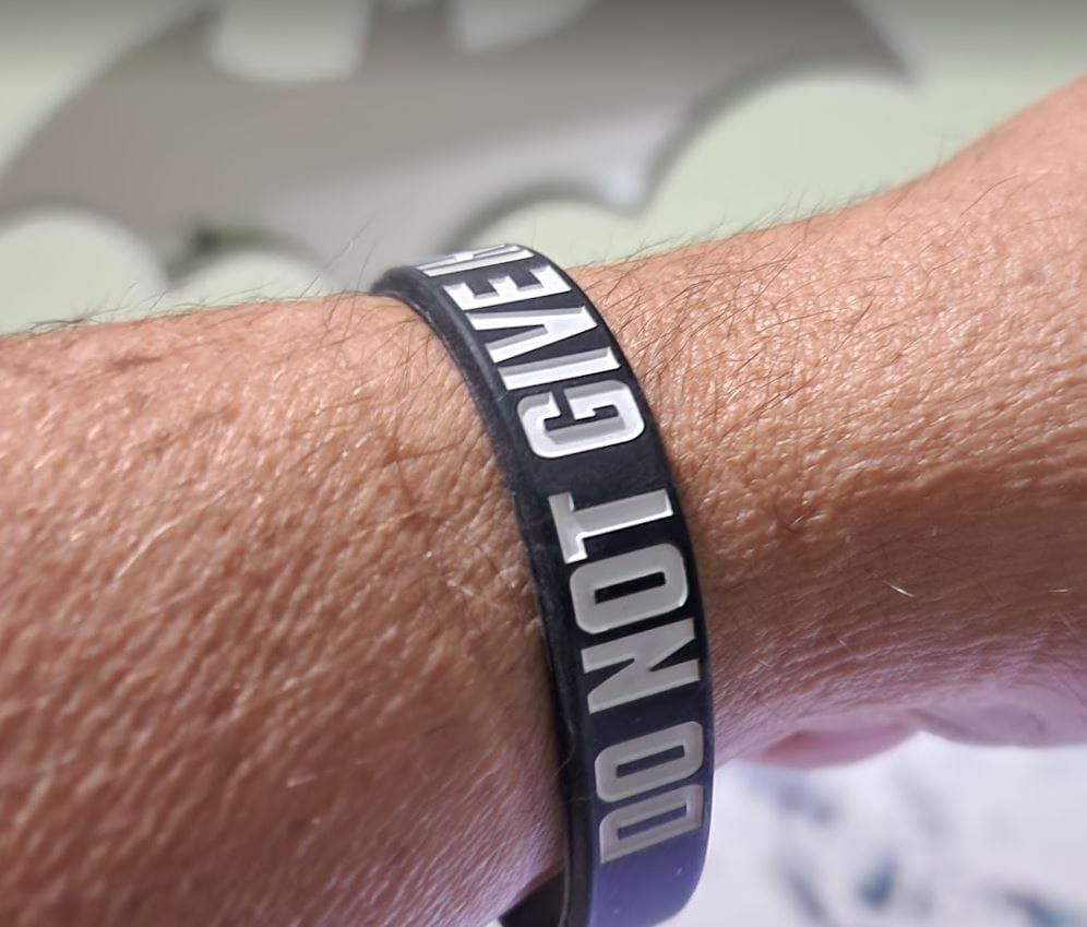 Customer photo review of Do Not Give In - Silicone Bracelet