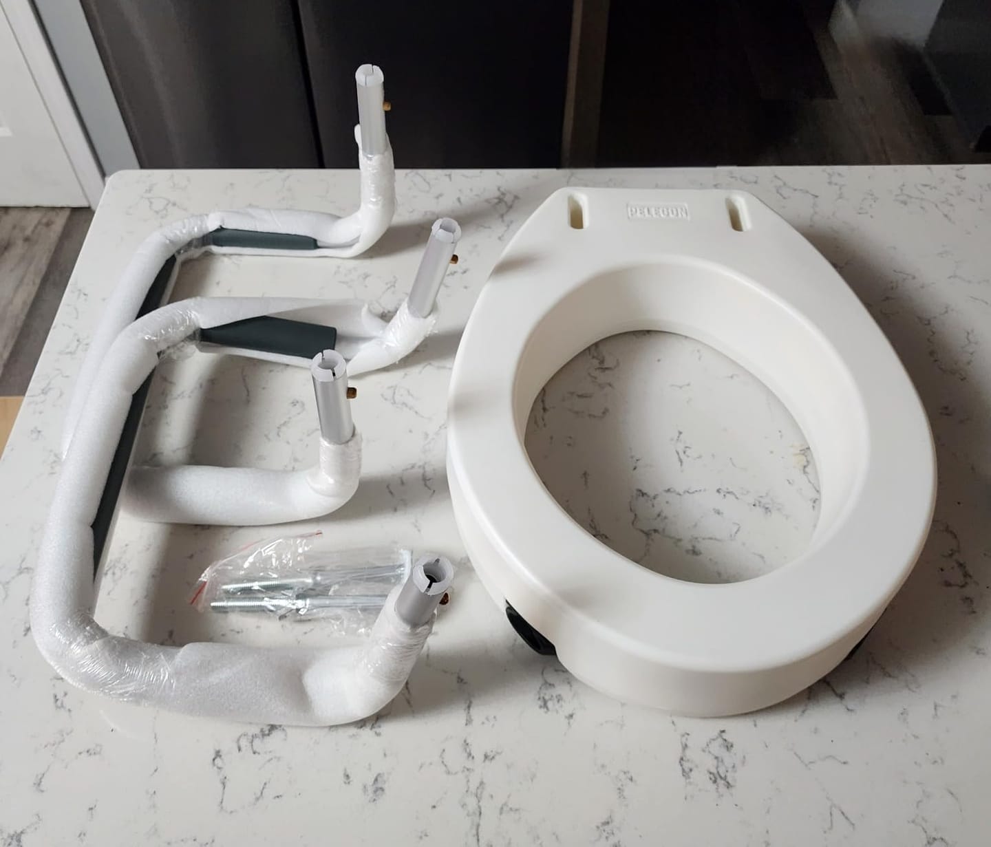 Customer photo review of Raised Toilet Seat With Handles (300lb)