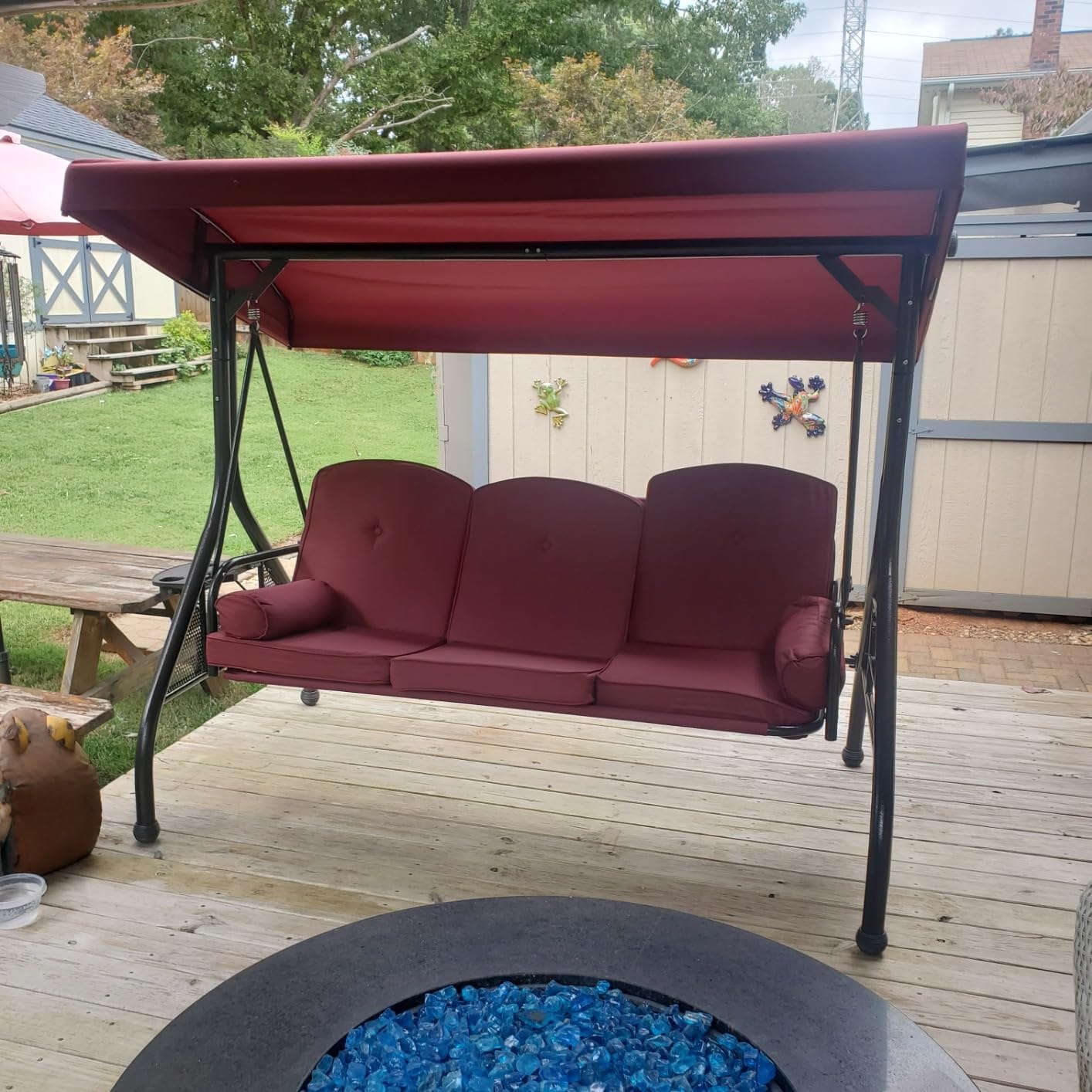 Customer photo review of 3-Seat Outdoor Porch Swing with Adjustable Canopy Backrest and 2 Side Trays, Wine Red