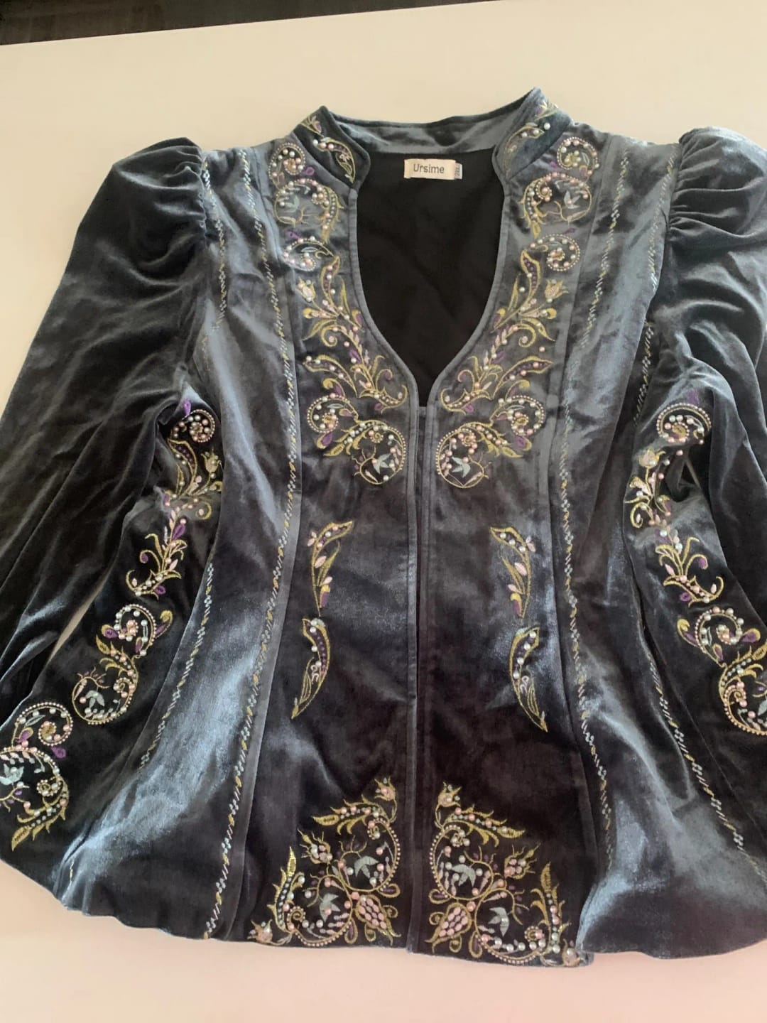 Customer photo review of Embroidered Peplum Velvet Blouse