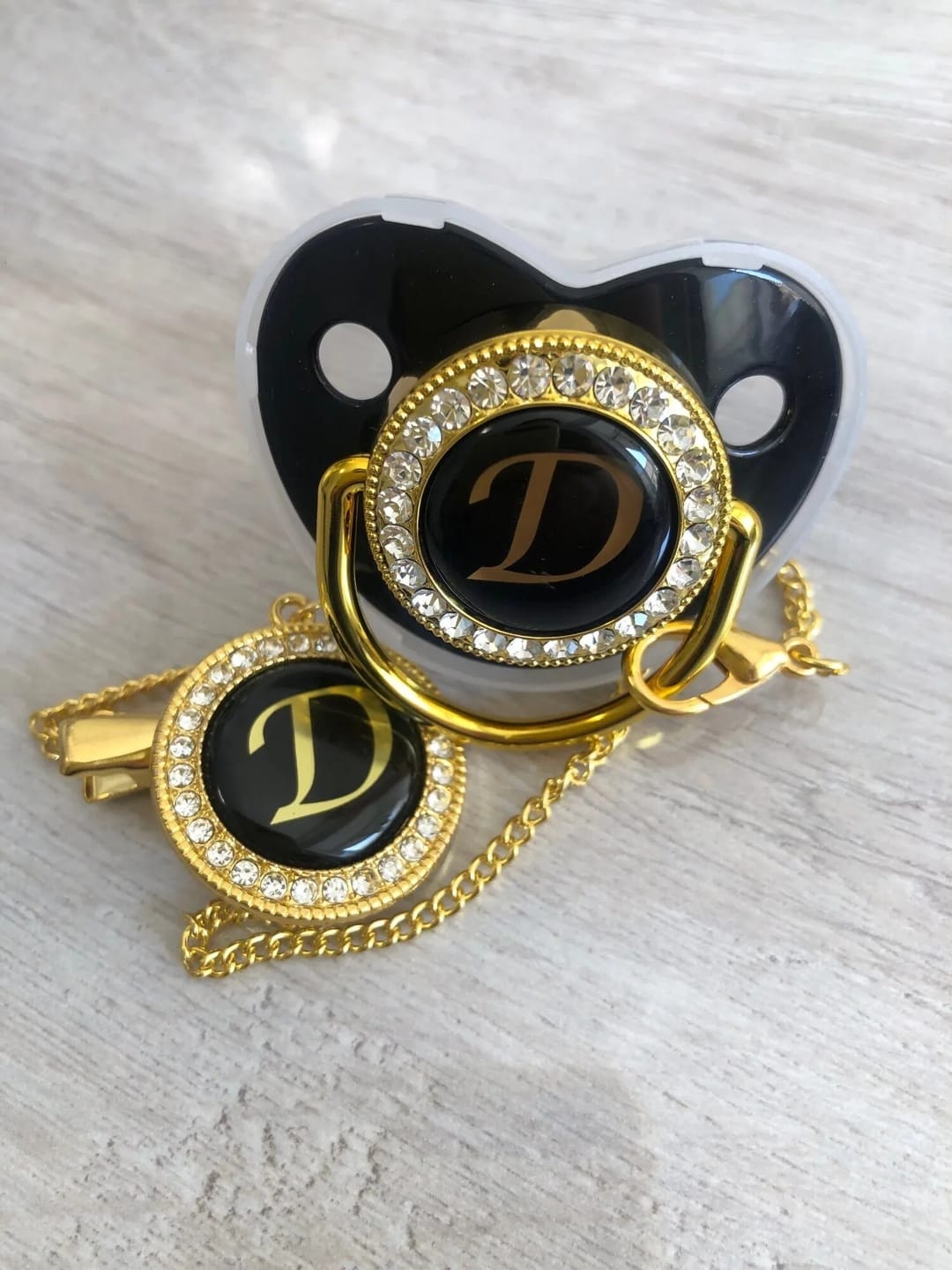 Customer photo review of Black/Gold Luxury Customized Baby Bling Pacifier