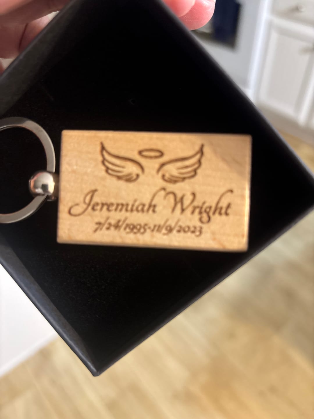 Customer photo review of Angel Wings Keychain - Customizable
