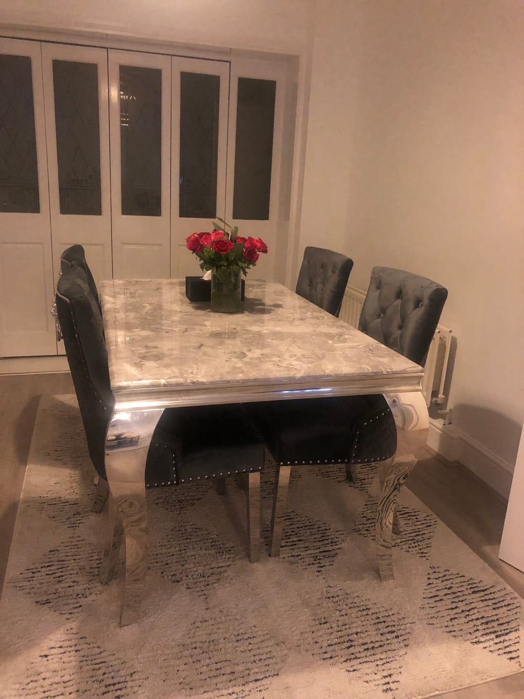Customer photo review of Vienna Marble Dining Table With Bently Knocker Chairs lion