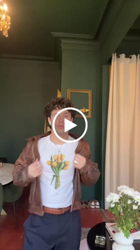 Customer video review of 'Tulips' baby tee