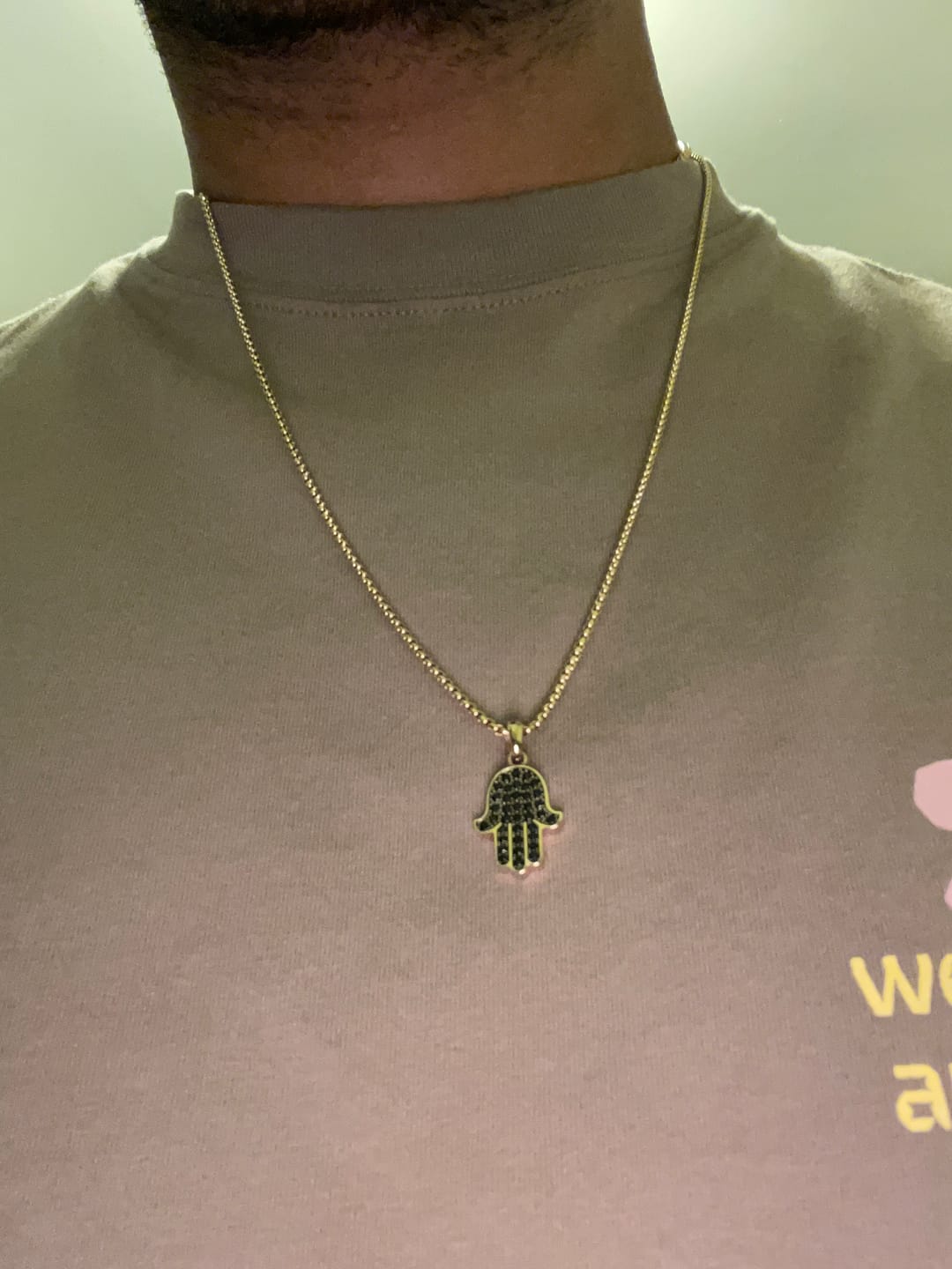 Customer photo review of Stone-Set Hamsa Pendant