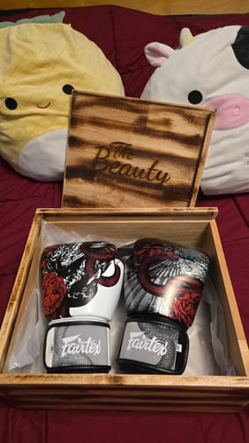Customer photo review of FAIRTEX THE BEAUTY OF SURVIVAL - LIMITED EDITION BOXING GLOVES - BGV24 (Comes with nylon bag or wooden box)